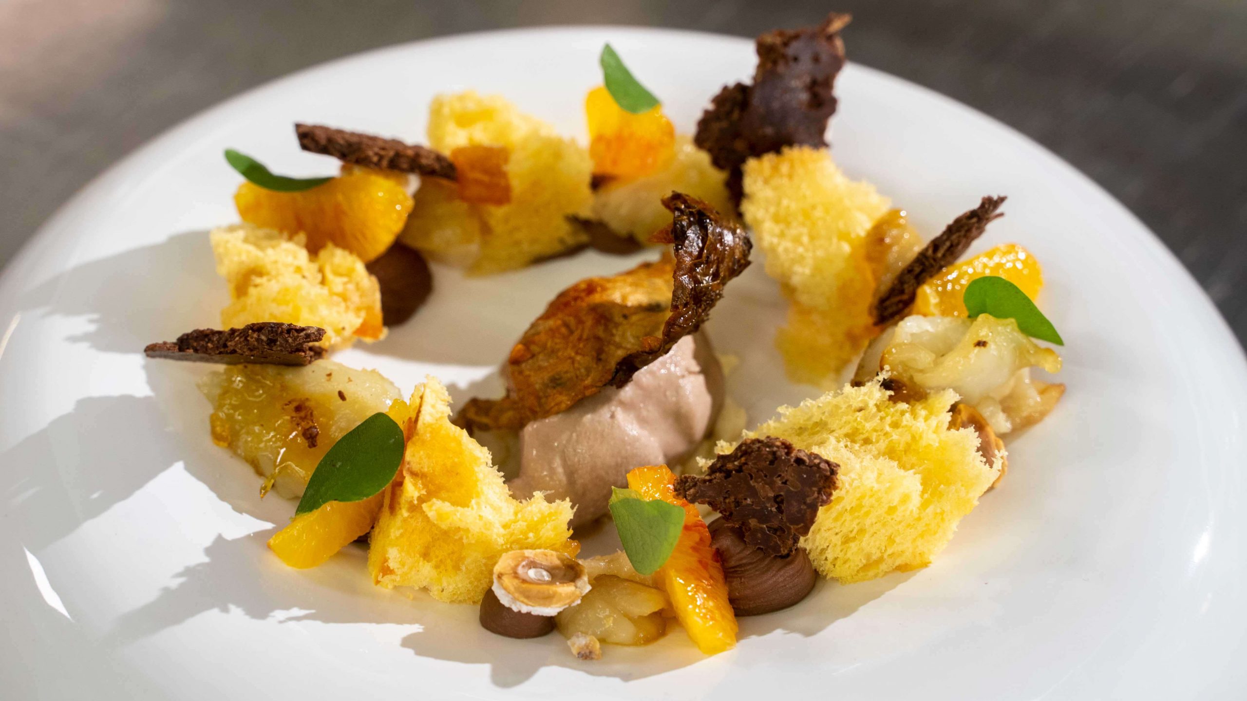 Autumn Delight: Panettone Loison with hazelnut ice cream, Jerusalem artichoke, and orange - Insolito